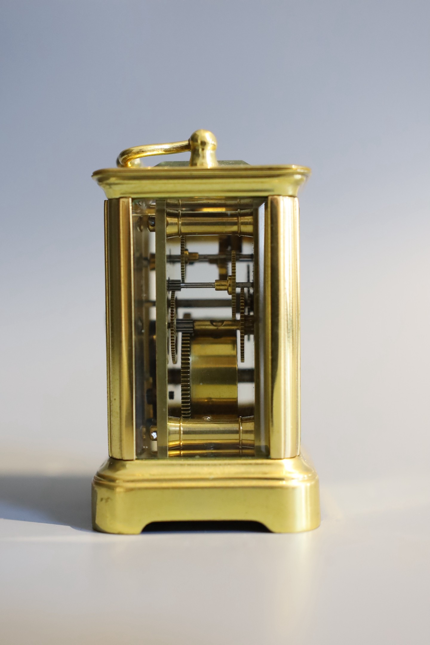 A 19th century French lacquered brass miniature carriage timepiece, height 7cm